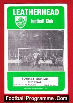 Leatherhead Football Club programme cover with green header and crest, a black-and-white match photo, and FootballProgramme.com footer.
