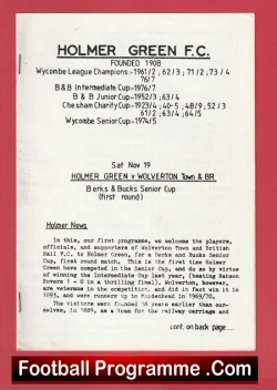 Front page of a vintage football programme for Holmer Green F.C., showing club name, founding year, match listings, and a footer reading 'Football Programme .Com'