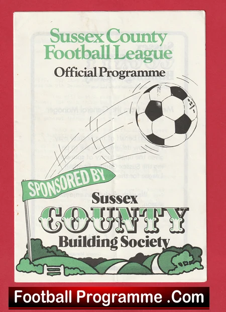Cover of a Sussex County Football League Official Programme featuring a flying soccer ball and a sponsor banner: 'Sponsored by Sussex County Building Society'