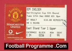 Football programme cover for Manchester United vs Chelsea, with the red Manchester United crest, a red background, and 'FootballProgramme.com' at the bottom.
