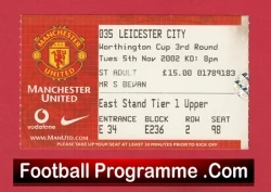 Manchester United football programme cover with a Leicester City ticket stub and a black 'Football Programme' banner at the bottom.