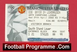 Football ticket for Manchester United vs. Bayer Leverkusen (Champions League) with seat details and a red Football Programme banner below.