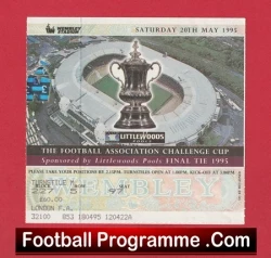 Cover of a football programme with an FA Cup trophy image over a stadium, text about the Football Association Challenge Cup, and a red bottom banner reading 'Football Programme.com'
