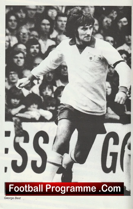 Black-and-white action shot of a footballer running with the ball on a crowded stadium, with a 'Football Programme .Com' watermark at the bottom.