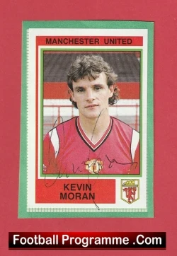 Vintage Manchester United trading card featuring Kevin Moran in a red jersey, with club crest and signature on a red background.