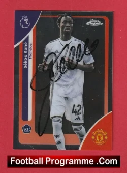 Autographed football trading card of a player in a white kit with number 42, posed against a red background.
