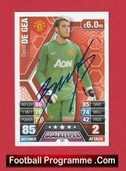 Signed football trading card featuring Manchester United goalkeeper David de Gea in a green kit, autograph across the card, with visible player stats and a red patterned background and 'Football Programme.Com' footer.